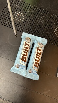 two bars of built chocolate sitting on a table